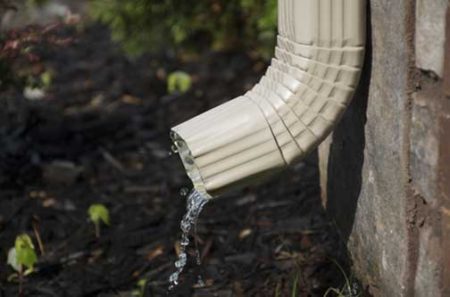 Downspout Disconnected to Save Water from the Creek